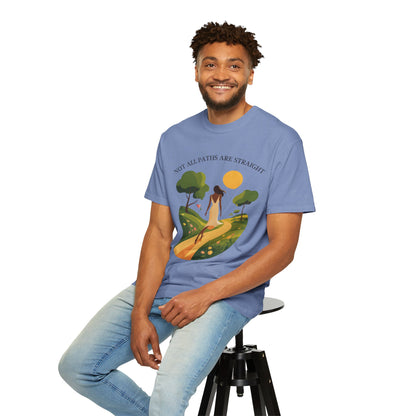 Inspirational Message T-Shirt featuring Not All Paths Are Straight worn by a smiling man sitting on a stool, showcasing the relaxed fit and garment-dyed fabric for casual, motivational wear.