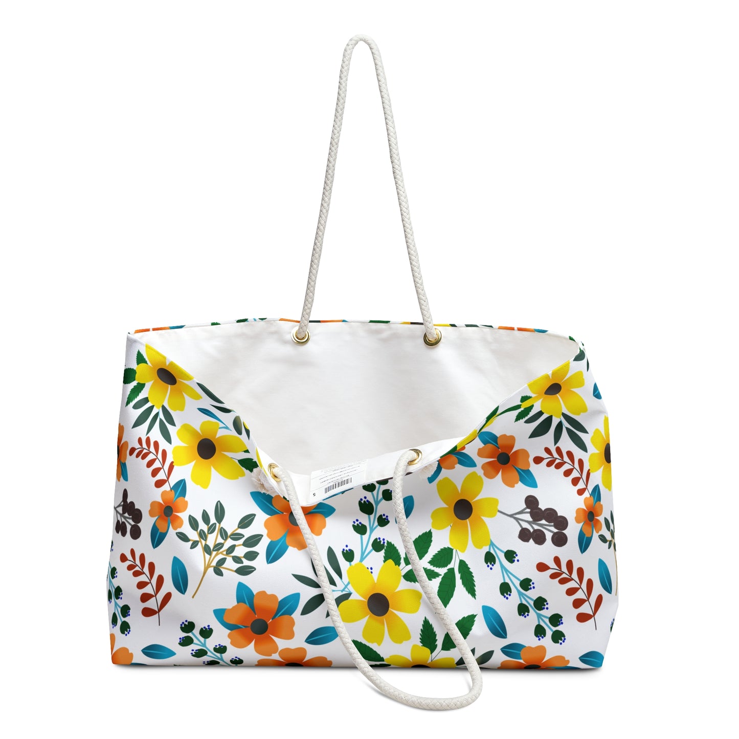 Weekender Bag featuring a bright floral pattern with yellow, orange, and teal blossoms, and sturdy white rope handles. Ideal for stylish trips, this spacious tote has a plain white interior.