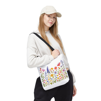 Wildflowers Tote Bag featuring a vibrant wildflower design, ideal for nature lovers. Durable polyester body with reinforced handles, perfect for daily use, shopping, or beach outings. Available in three sizes for convenience.