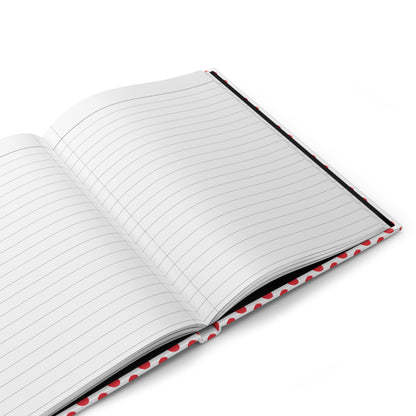 HARDCOVER JOURNAL, MATTE, RULED, 5X7, SEWN BIND, CLEAN-TEAR PAGES – CLASSIC DOT, RED, features a red-polka-dot cover, open to display two blank, lined pages with durable, matte lamination.
