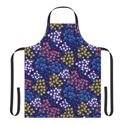 Floral Apron in a classic bib shape, featuring vibrant floral patterns on a navy-blue background with black straps, embodying FireBrook Designs' joyful and stylish essence for versatile kitchen and craft use.