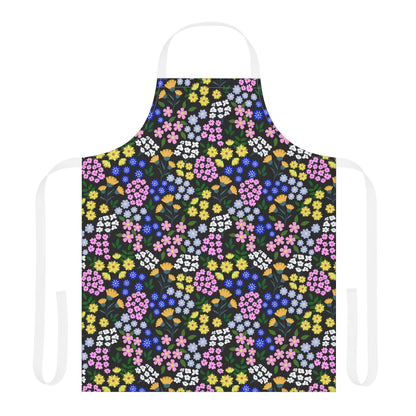 Apron Floral Design: A vibrant apron with a multicolored floral pattern, featuring a white neck loop and ties, crafted from soft, stain-free polyester canvas, perfect for joyful, stylish cooking and crafting.