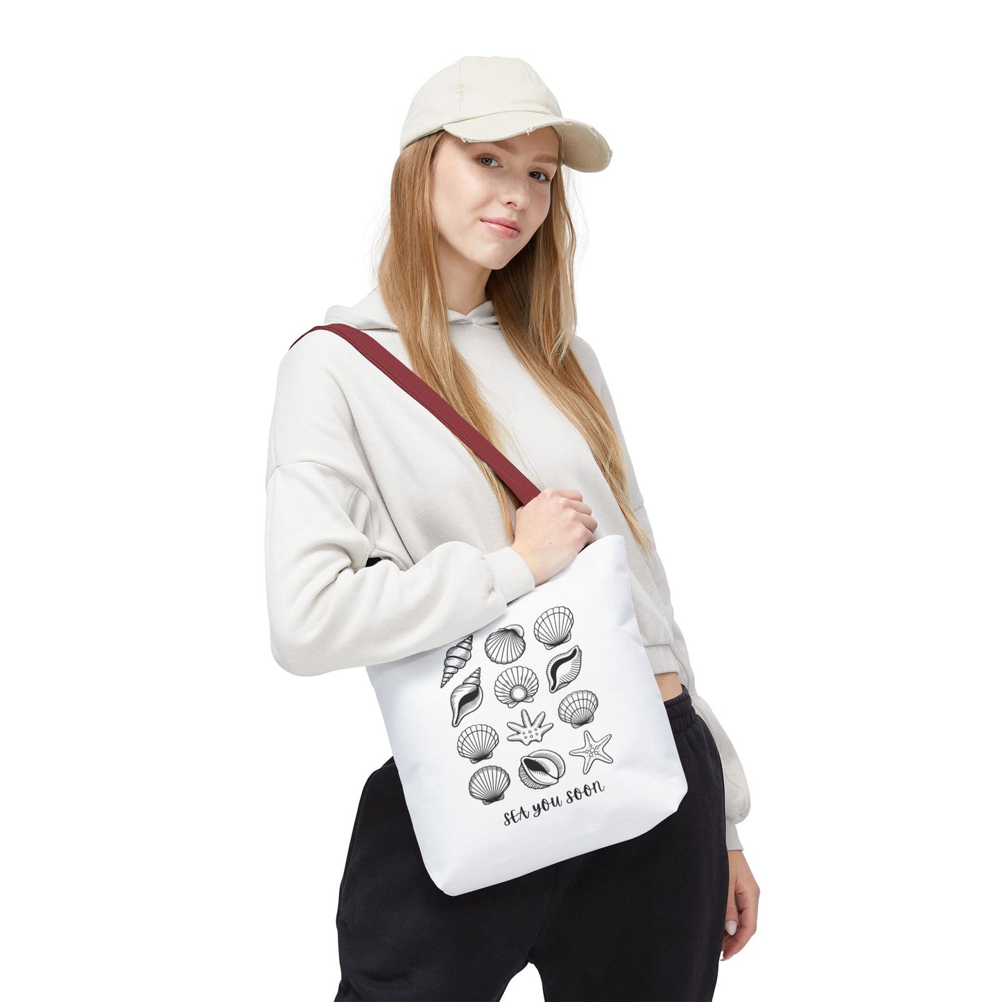 Sea Shells Tote Bag with a beachy design, featuring durable polyester fabric and reinforced stitching, ideal for beach trips and nautical-themed outings. Available in three sizes with strong handles.