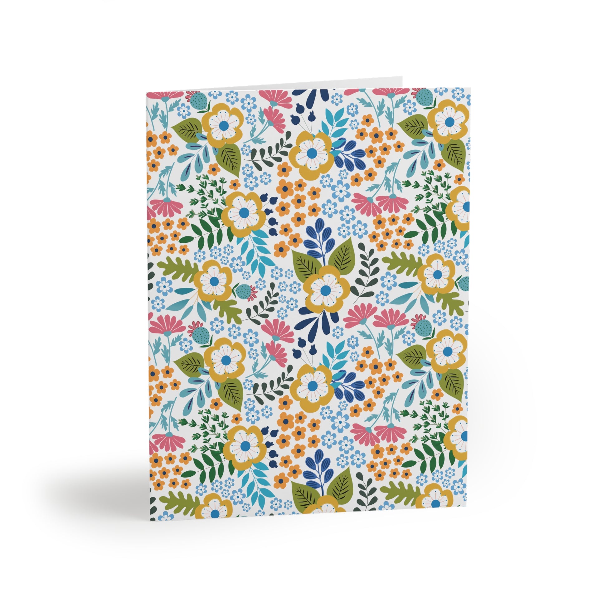 Wildflower Greeting Cards — Pack of 8/16/24 featuring hand-drawn wildflowers and greenery on a matte-finish card, offering a cheerful, springtime vibe. Perfect for sending heartfelt notes.