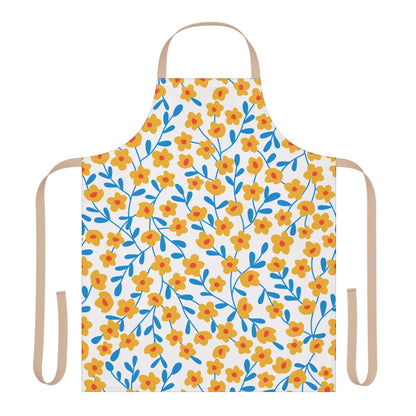 Floral Apron featuring vibrant yellow flowers with orange centers and blue leaves on a white background. This stain-free, full-coverage apron includes beige ties, offering comfort and style for any kitchen activity.