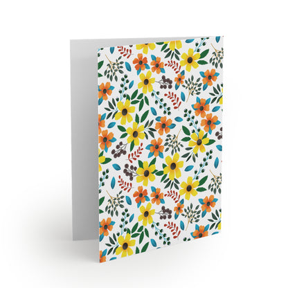 Floral Greeting Cards — Pack of 8/16/24 feature vibrant yellow and orange blossoms with dark-brown berry clusters on a white matte-finish, blank inside. Perfect for sending cheerful, personal messages.