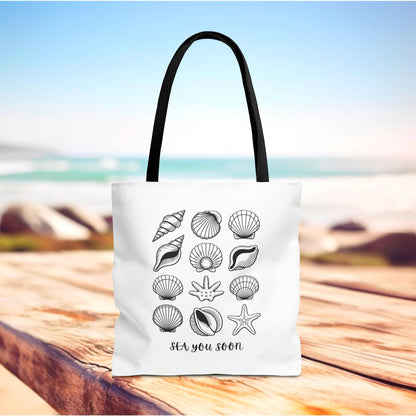 Sea Shells Tote Bag featuring a beachy design, ideal for seaside adventures. Made from durable polyester with reinforced stitching, it offers ample space and comes in various handle colors for summer outings.