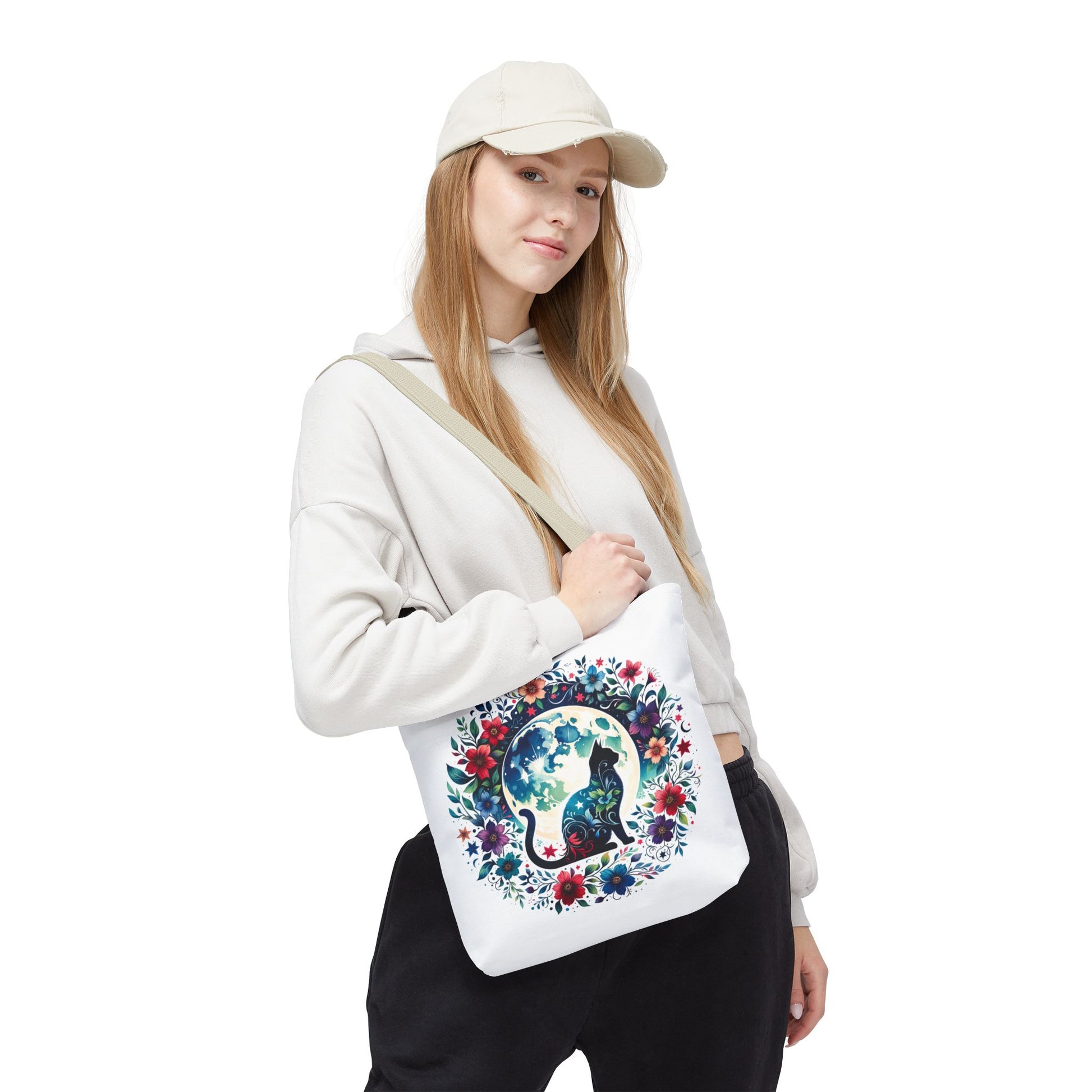 Lone Cat Under the Moon Tote Bag, featuring a whimsical cat design, perfect for feline enthusiasts. Durable polyester with reinforced handles, ideal for errands or beach outings. Available in various sizes.