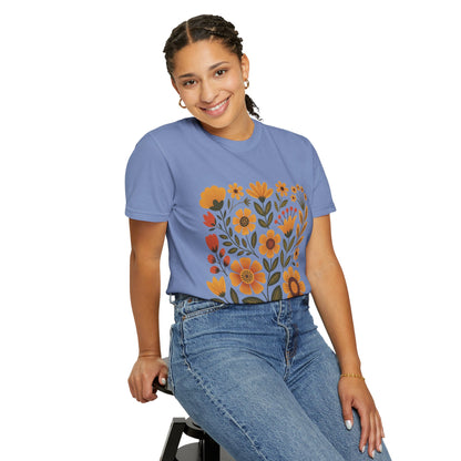 Folk Art in Warm Yellows Floral T-Shirt featuring an artistic folk art floral design in warm earth tones, perfect for casual wear. Made of high-quality cotton with a relaxed fit and crew neckline.