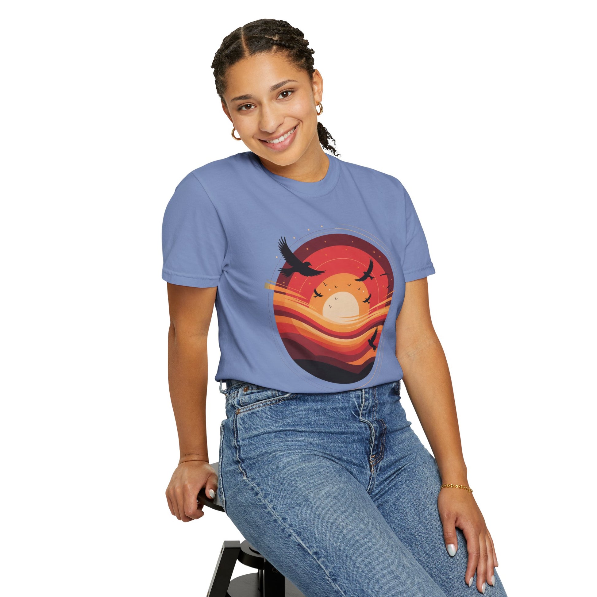 Sunset Energy Abstract T-Shirt with bold, layered concentric rings and silhouetted birds, evoking dynamic motion and warmth. Perfect for adding vibrant energy to casual outfits.
