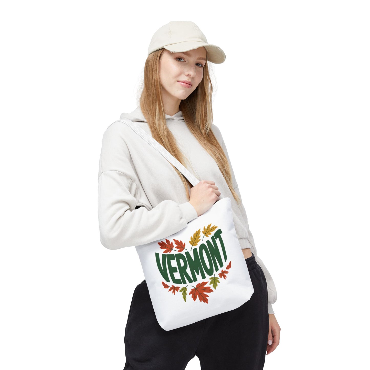 Close-up of a person holding the Vermont Tote Bag, highlighting its reinforced stitching and boxed corners. A durable, stylish accessory from FireBrook Essentials, ideal for daily essentials.