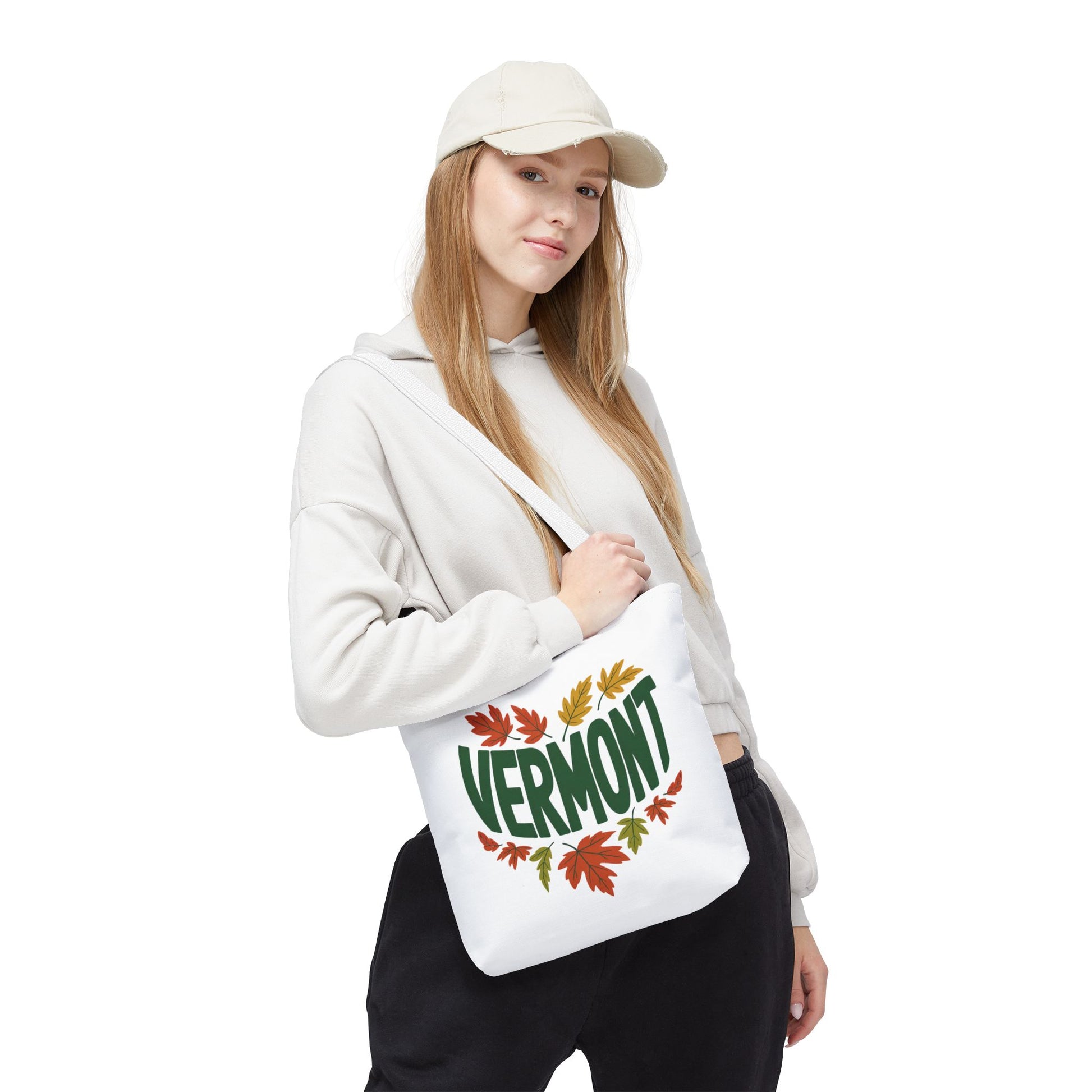 Close-up of a person holding the Vermont Tote Bag, highlighting its reinforced stitching and boxed corners. A durable, stylish accessory from FireBrook Essentials, ideal for daily essentials.