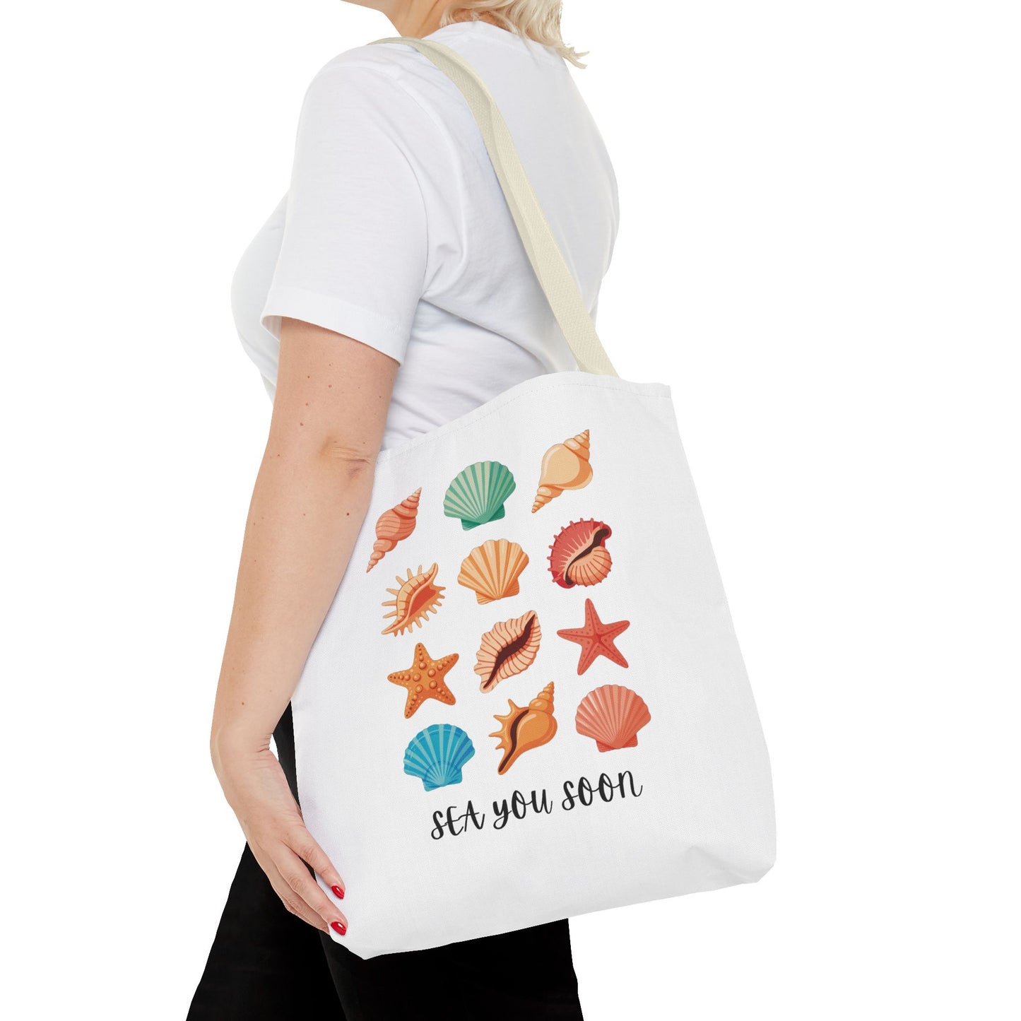 Sea You Soon Sea Shells Tote Bag featuring a beachy design with seashells, perfect for ocean lovers. Durable polyester with reinforced handles, ideal for beach trips and casual outings.