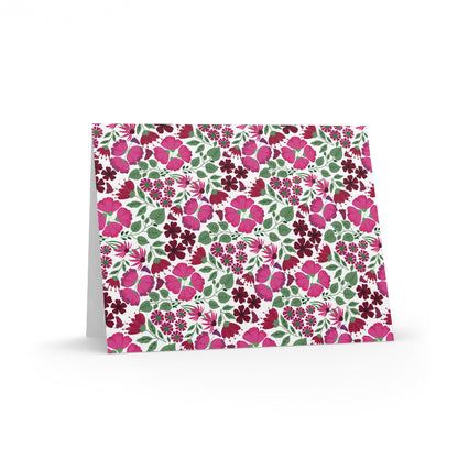 Floral Greeting Cards — Pack of 8/16/24 features a vibrant, edge-to-edge floral pattern with pink and burgundy blooms on a white background. Each matte-finish card includes a matching white envelope.