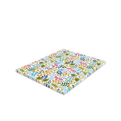 Wildflower Greeting Cards — Pack of 8/16/24 feature a vibrant floral print on a soft white background, capturing spring's essence. These folded cards come with matching envelopes, perfect for any heartfelt message.