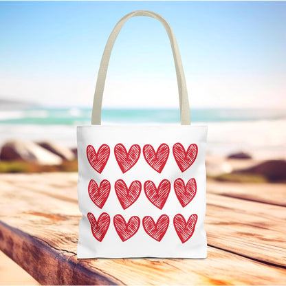 Hearts Tote Bag featuring playful red hearts on a white background, embodying FireBrook Designs' uplifting style. Ideal for adding charm to daily outfits, with durable polyester and reinforced handles.