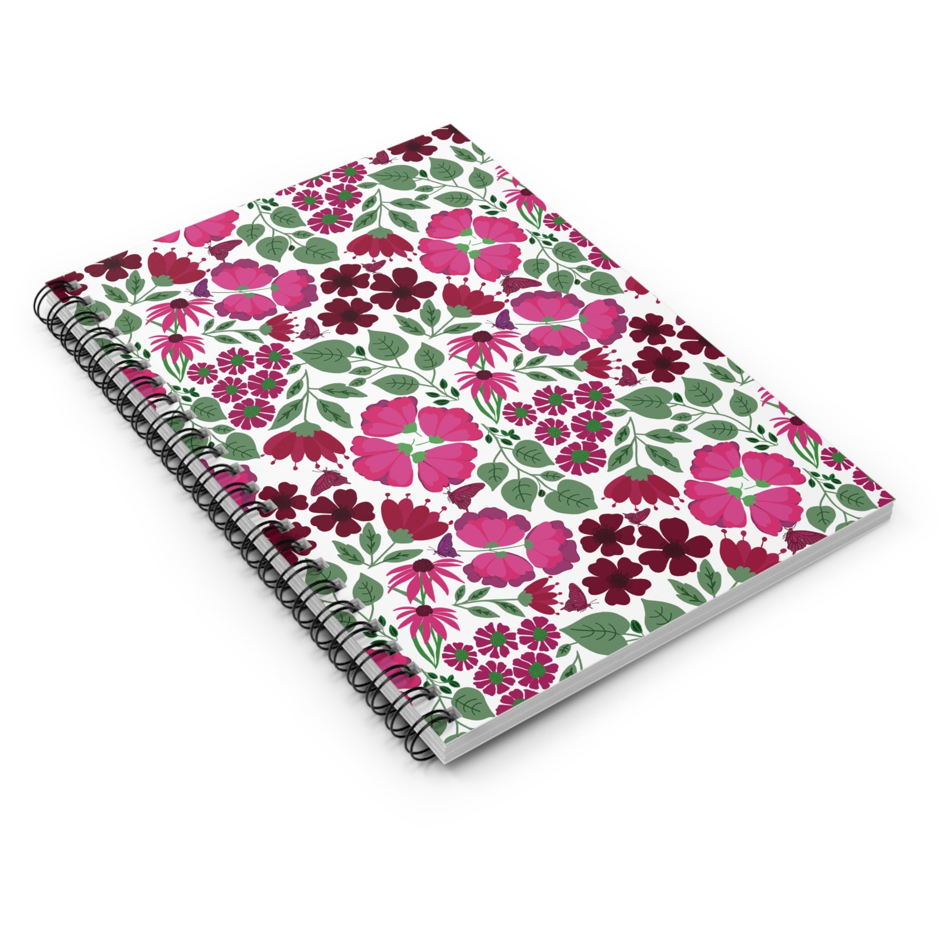 Floral Spiral Notebook featuring vibrant pink and burgundy blossoms on a white cover, ideal for creative expression. Designed for easy page turning with a durable metal spiral, perfect for everyday use.
