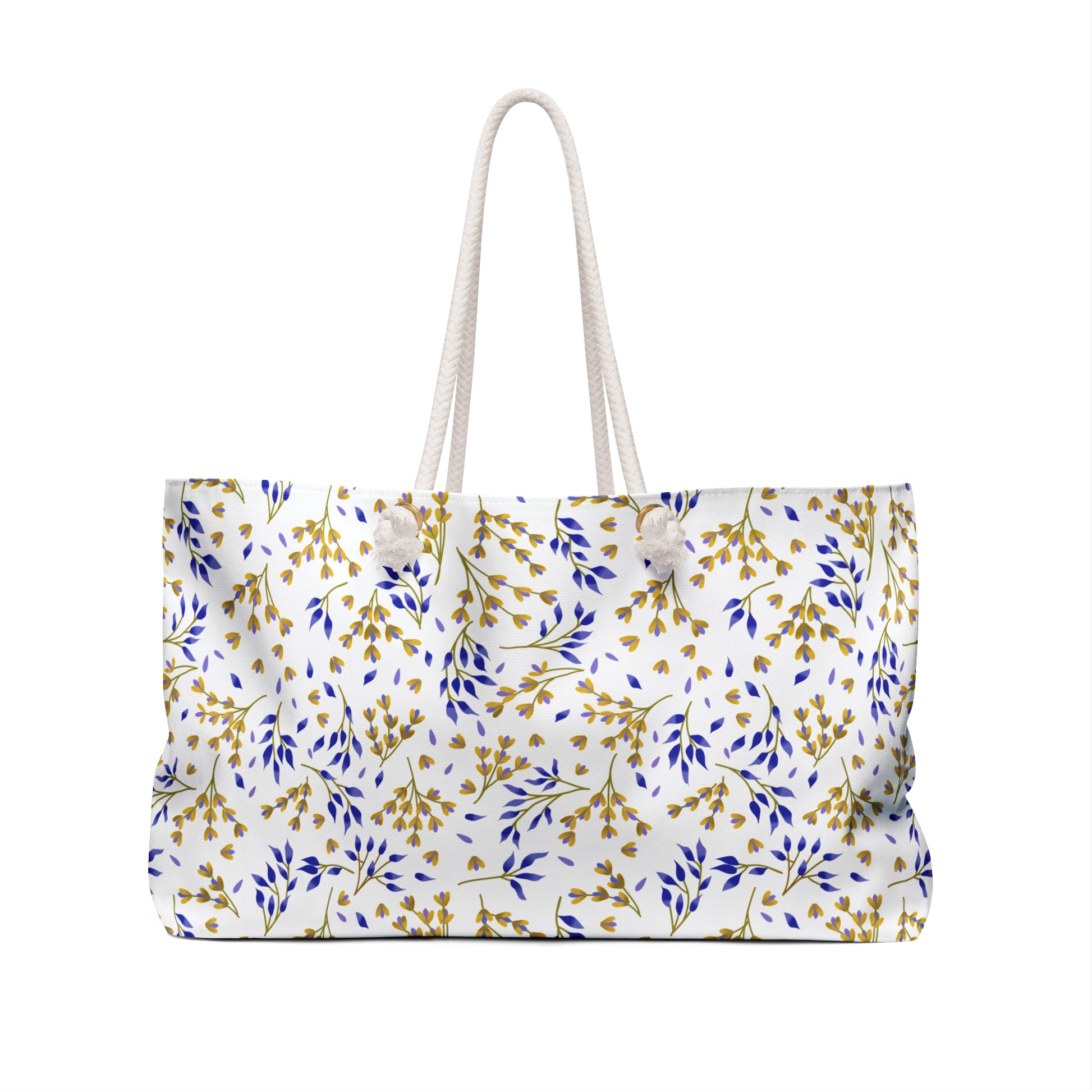 Weekender Bag with thick white rope handles, featuring a white fabric adorned with gold and blue leafy sprigs, perfect for stylish travel, offering spacious storage and a luxurious cream interior.