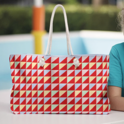 Weekender Bag - Geometric Triangles Design: A stylish, modern bag with a triangle pattern, featuring rope handles and gold grommets, perfect for weekend getaways and overnight stays.