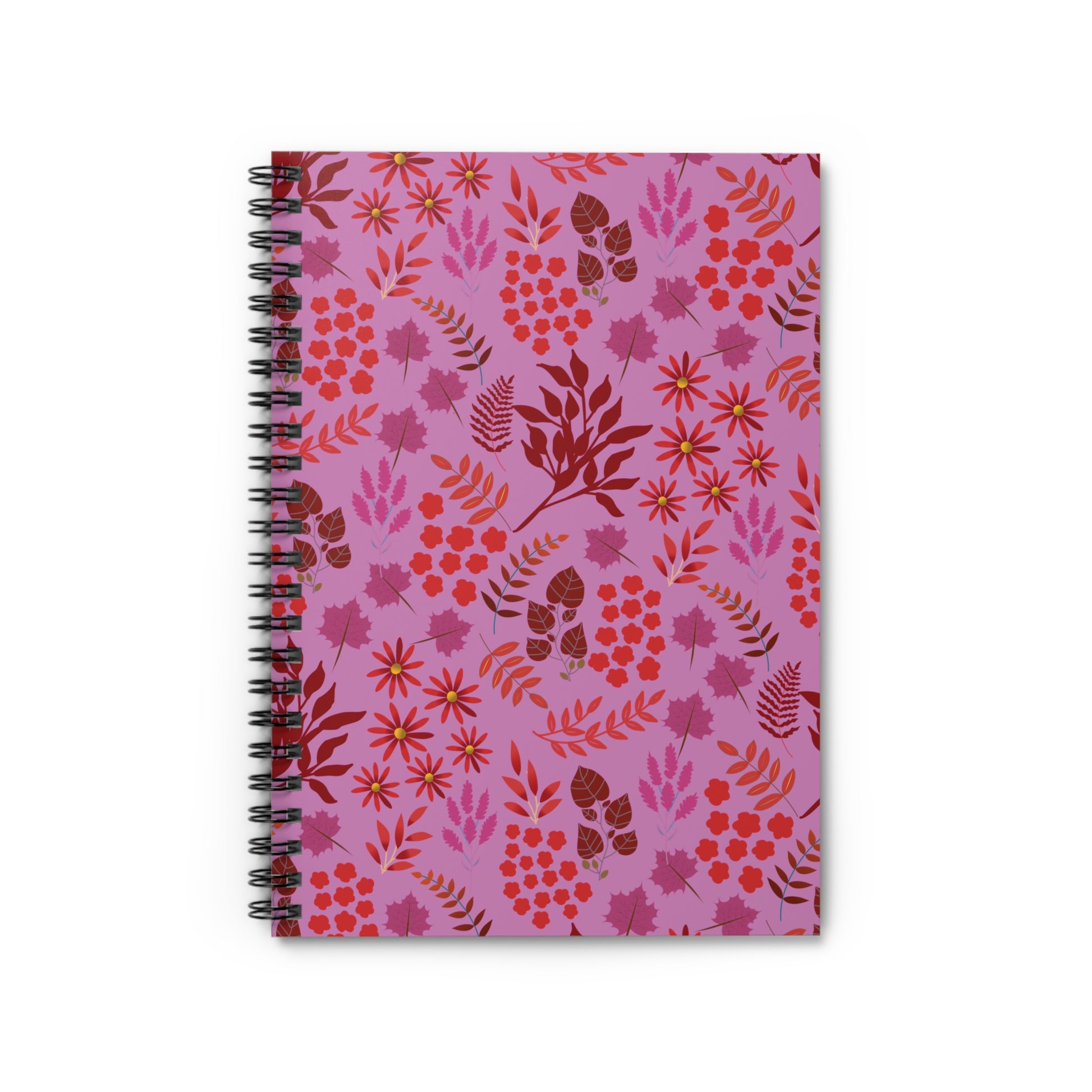 Floral Spiral Notebook with a pinkish-purple cover featuring a vibrant botanical pattern of red, orange, and magenta elements. Durable metal spiral binding for easy page turns; compact, eco-friendly design. Ideal for creative expression.