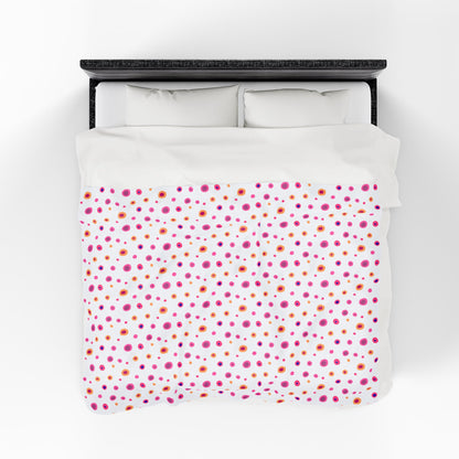 Circles Pink and Yellow (Medium) Velveteen Plush Blanket, featuring a vibrant design and plush texture, ideal for cozy evenings. Perfect for adding warmth and style to any home setting.