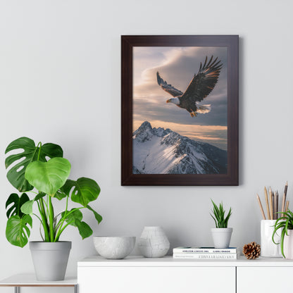 Vertical Poster - Magnificent Bald Eagle Soaring Over Snow-Capped Mountains, framed and ready to hang. This stunning nature photograph captures the eagle mid-flight, embodying adventure and awe, perfect for nature enthusiasts.