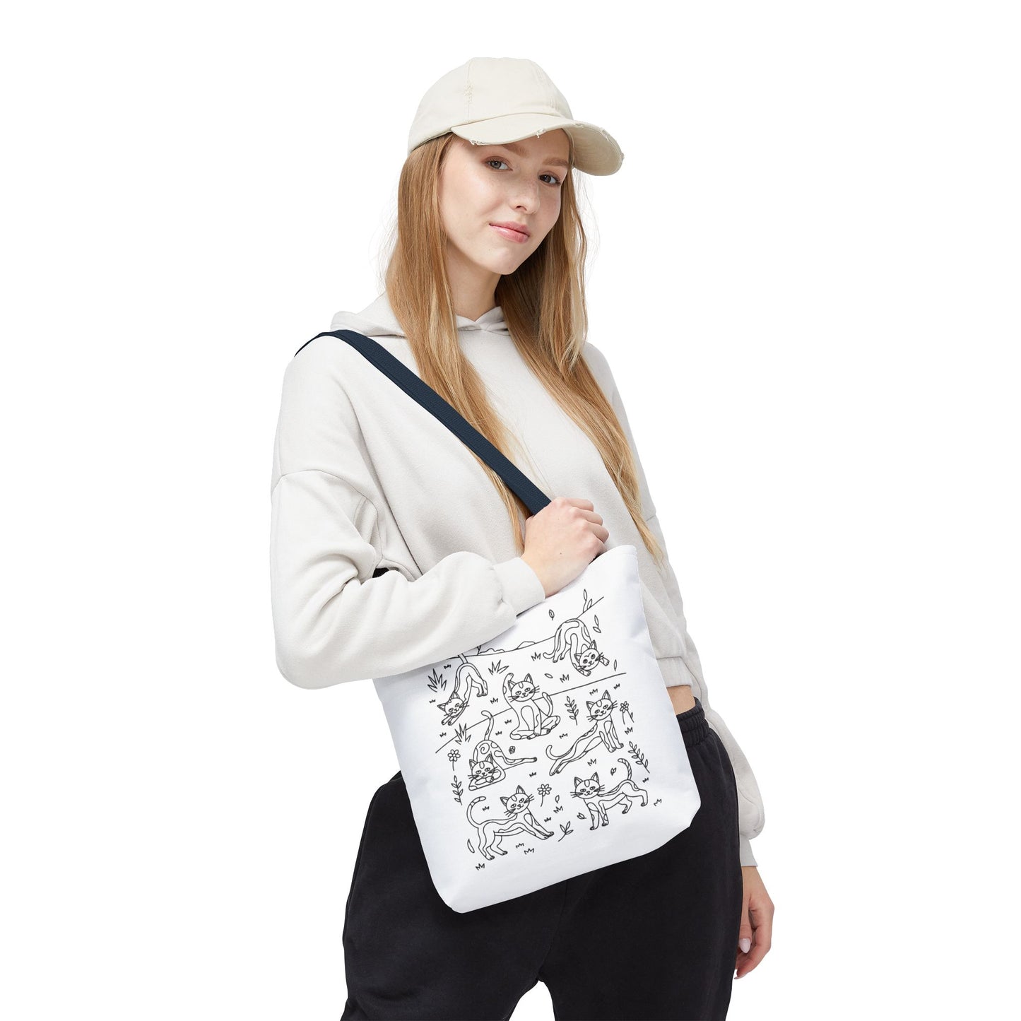 Yoga Cat Tote Bag featuring whimsical illustrations of cats in yoga poses, perfect for cat lovers and yoga enthusiasts. Ideal for carrying essentials, showcasing FireBrook Designs' playful and uplifting style.