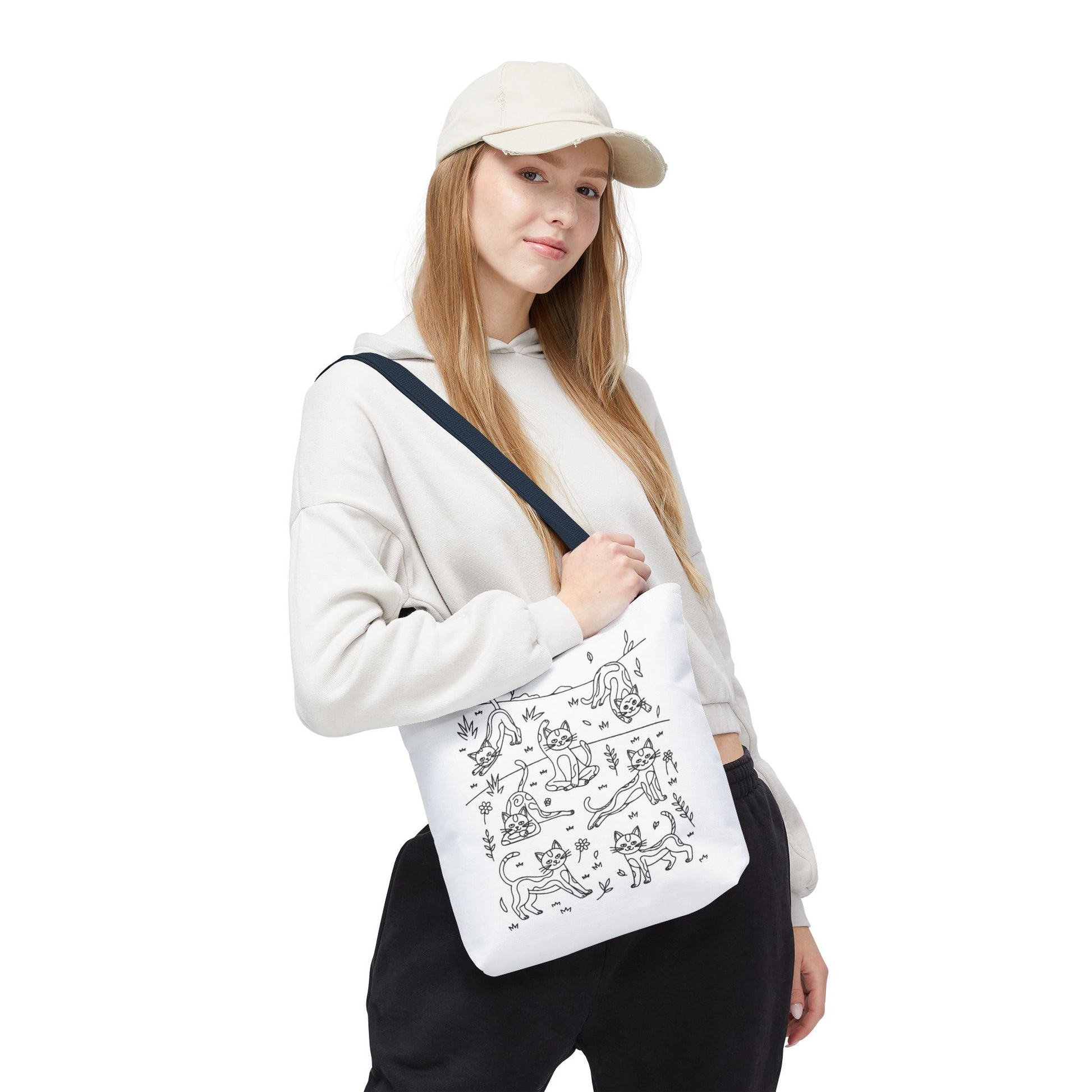 Yoga Cat Tote Bag featuring whimsical illustrations of cats in yoga poses, perfect for cat lovers and yoga enthusiasts. Ideal for carrying essentials, showcasing FireBrook Designs' playful and uplifting style.