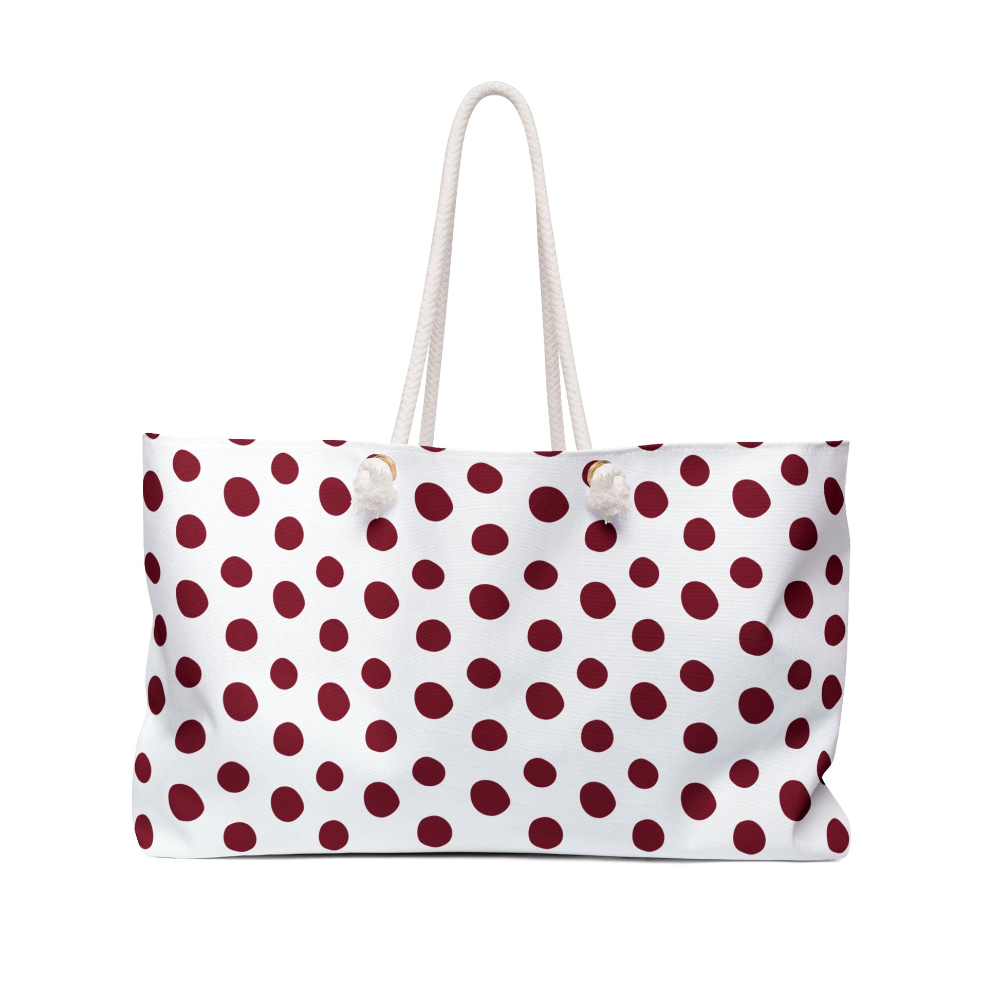Burgundy Weekender Bag with cream rope handles and gold grommets, featuring a white and red polka dot pattern, perfect for stylish weekend getaways and travel.