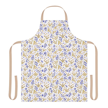 Floral Apron by FireBrook Designs, featuring a gold and blue leaf pattern on a white polyester canvas, complete with tan ties for a comfortable fit, ideal for joyful cooking and crafting.