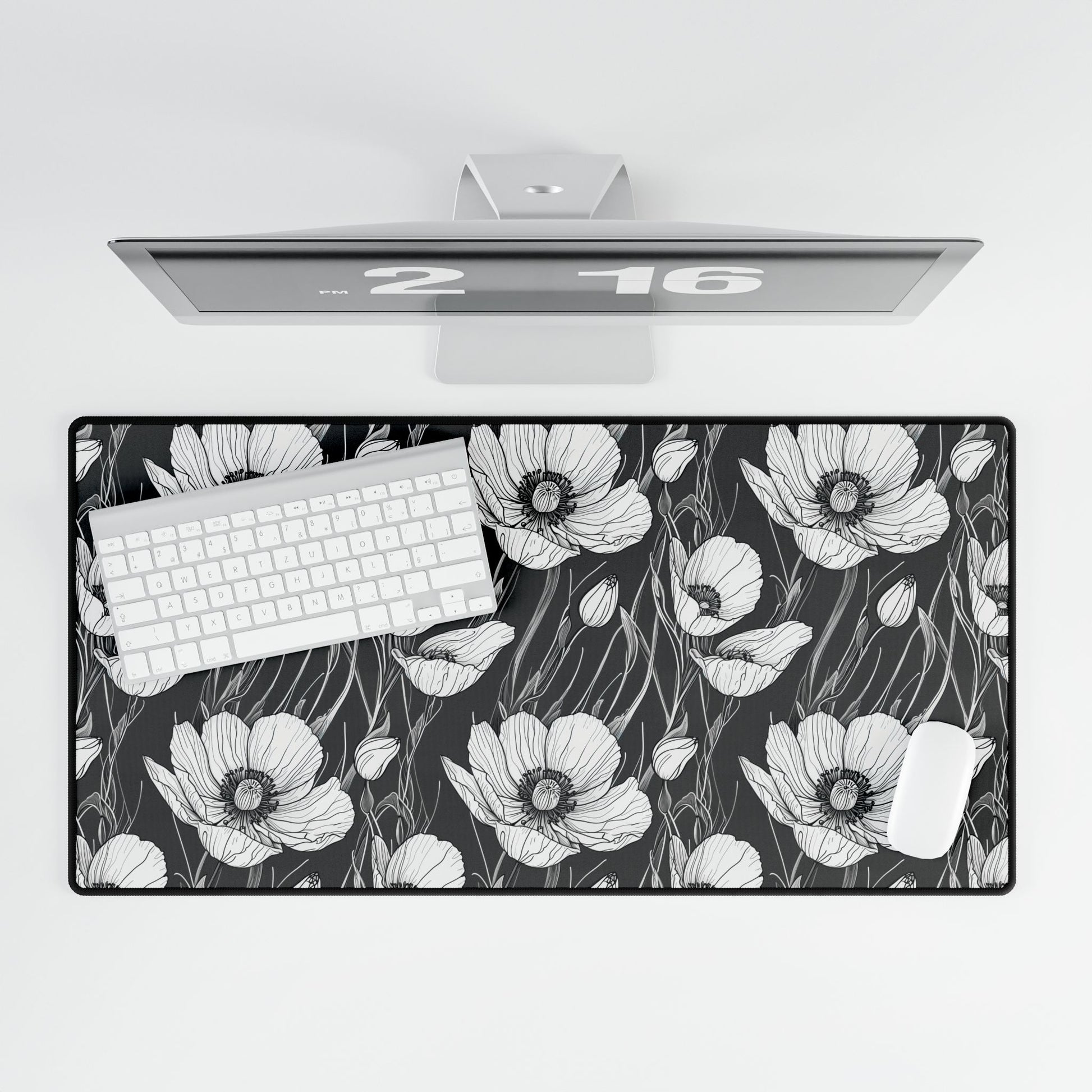 Monochrome Poppies Floral Desk Mat features a detailed black-and-white poppy line art pattern, showcasing intricate floral design on a charcoal backdrop, perfect for enhancing desk aesthetics with elegance and functionality.