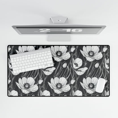 Monochrome Poppies Floral Desk Mat features a detailed black-and-white poppy line art pattern, showcasing intricate floral design on a charcoal backdrop, perfect for enhancing desk aesthetics with elegance and functionality.