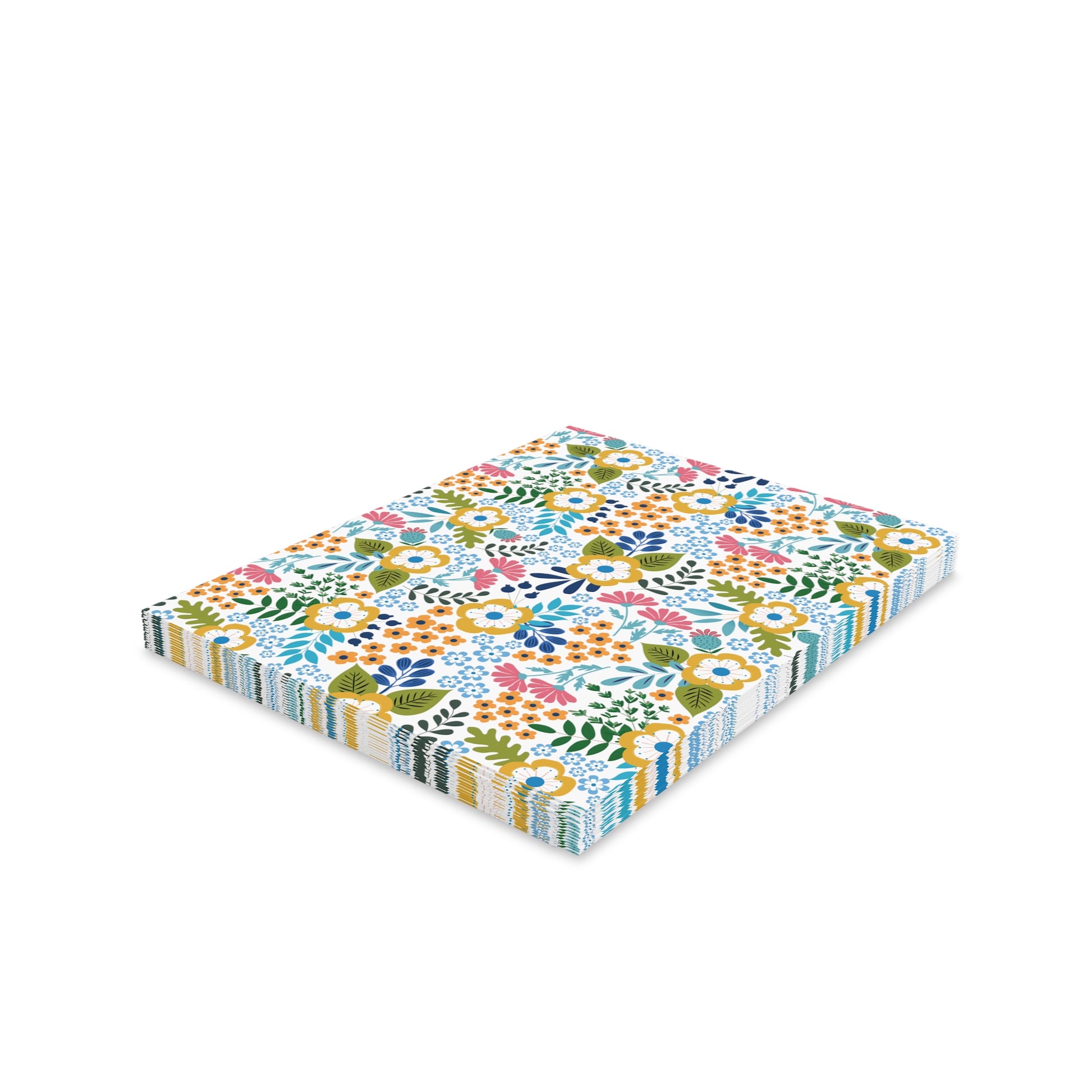 Wildflower Greeting Cards — Pack of 8/16/24 features a stack of cards with hand-drawn wildflowers on a matte white background, offering a cheerful, springtime vibe, each with a matching envelope.