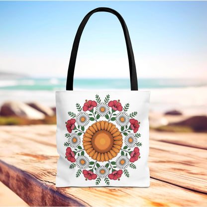 Mandala Sunflowers & Daisies Tote Bag featuring a detailed floral mandala design with sunflowers, daisies, and hibiscus, displayed on a wooden surface. Ideal for summer outings, reflecting boho-chic style.