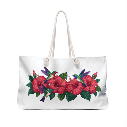 Tote Bag with hummingbirds and hibiscus design, showcasing vibrant hummingbirds hovering over hibiscus flowers. Ideal for stylish weekend getaways, reflecting FireBrook Designs' commitment to unique, uplifting products for joyful travel experiences.