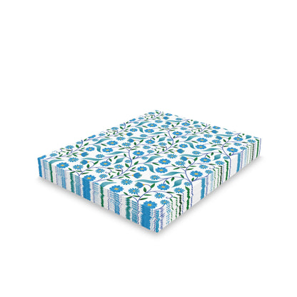 Floral Greeting Cards — Pack of 8/16/24, featuring a vibrant blue-and-green floral pattern on white, neatly stacked. These cards embody cheerful elegance, ready to convey gratitude or celebration with matching envelopes.