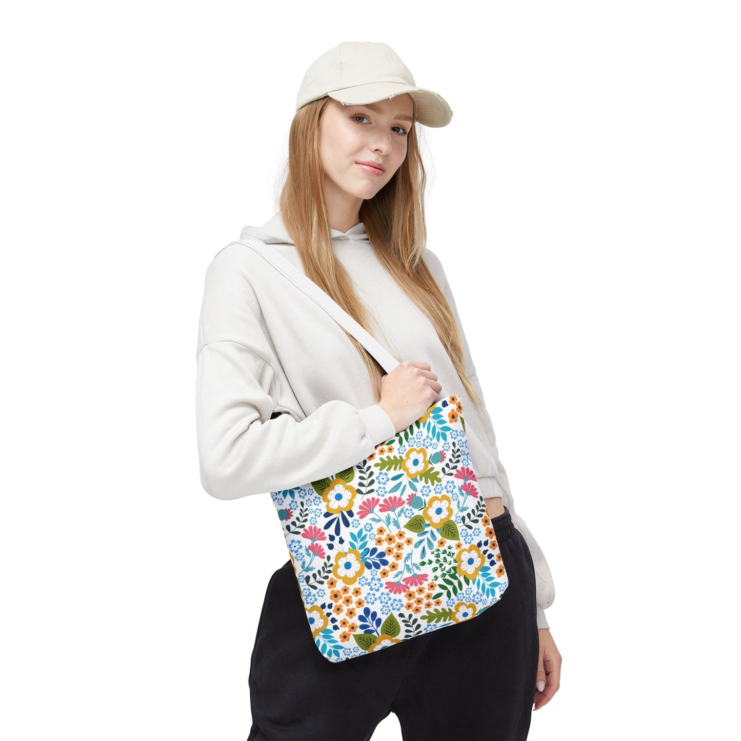 Floral Tote Bag slung over shoulder, showcasing its vibrant multicolored floral design. Perfect for summer outings, this bag embodies FireBrook Designs' cheerful, uplifting style.