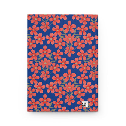 HARDCOVER JOURNAL, MATTE, RULES, 5X7, SEWN BIND, CLEAN-TEAR PAGES; features a navy-blue cover with coral-red floral pattern, small barcode in corner. Designed for durability and ease by FireBrook Essentials.