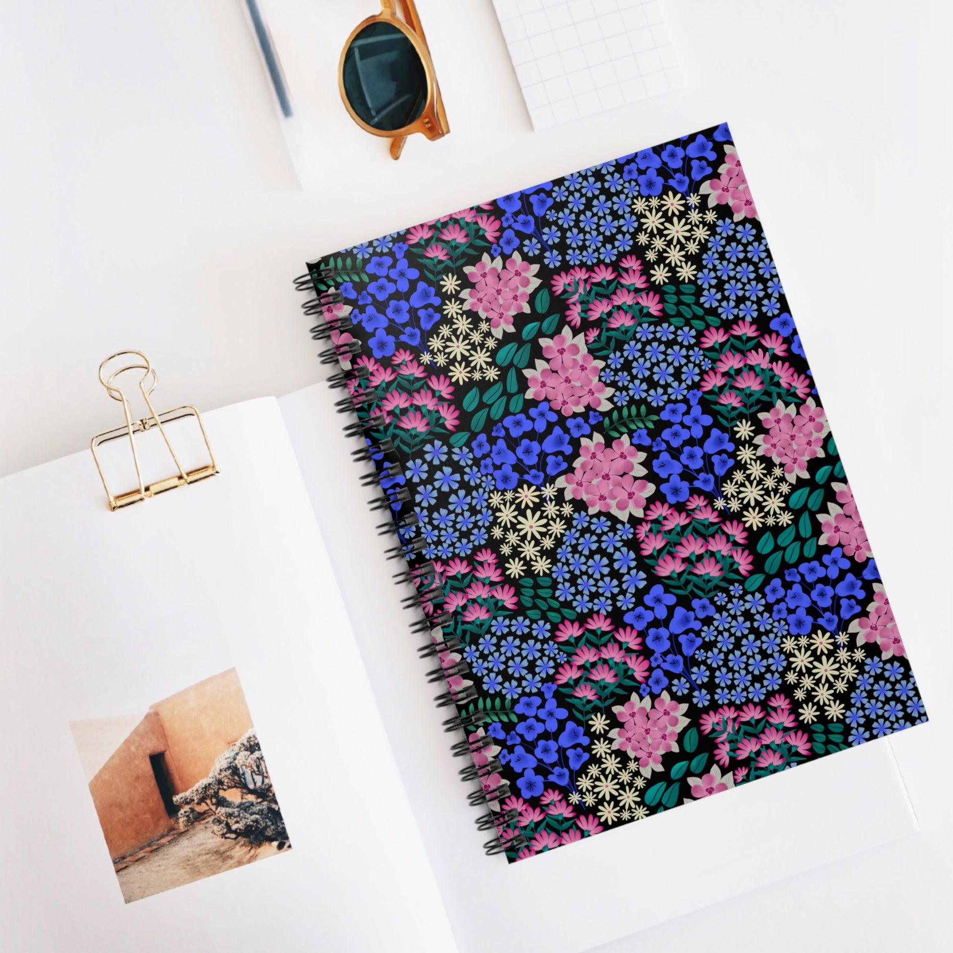 Floral Spiral Notebook with vibrant blooms and sleek metal spiral binding, perfect for creativity and organization. Ideal for students and professionals, enhancing your workspace with style and functionality.