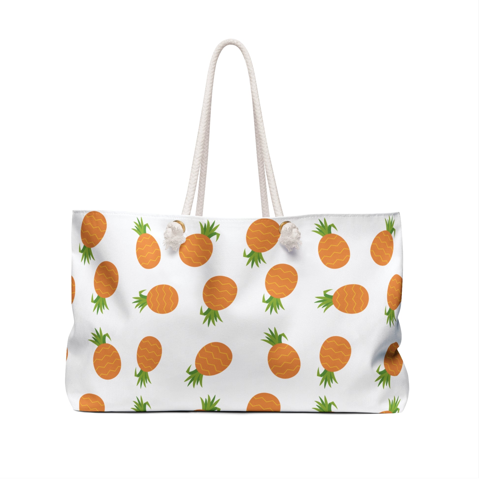 Weekender Bag - Pineapple Pattern: A stylish white bag adorned with orange pineapples, featuring cream rope handles and gold grommets, perfect for travel, embodying FireBrook Designs' joyful and uplifting style.