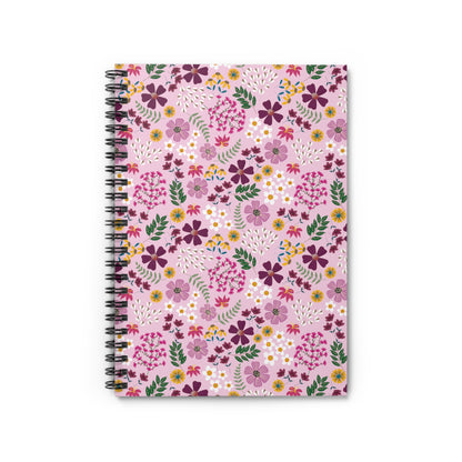 Floral Spiral Notebook featuring vibrant floral patterns with a sleek black spiral binding, designed for easy page turning. Ideal for jotting notes or sketching, it embodies FireBrook Designs' uplifting style.