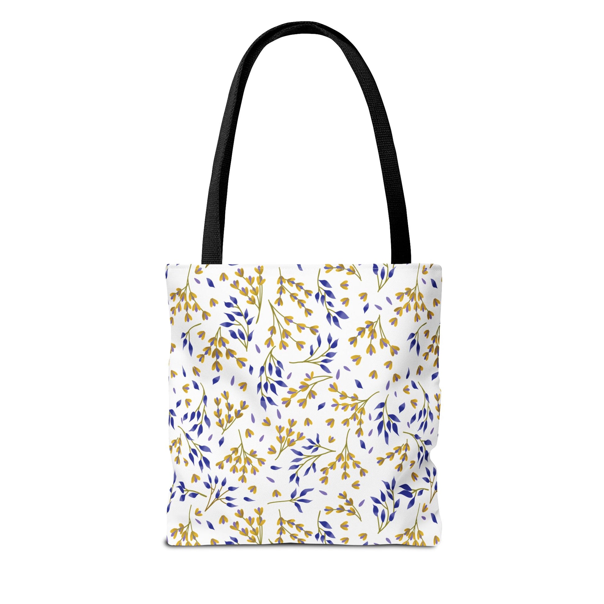 Floral Tote Bag from FireBrook Designs features a botanical pattern with golden yellow and deep blue sprigs on a white background, complemented by black handles, perfect for joyful, stylish outings.