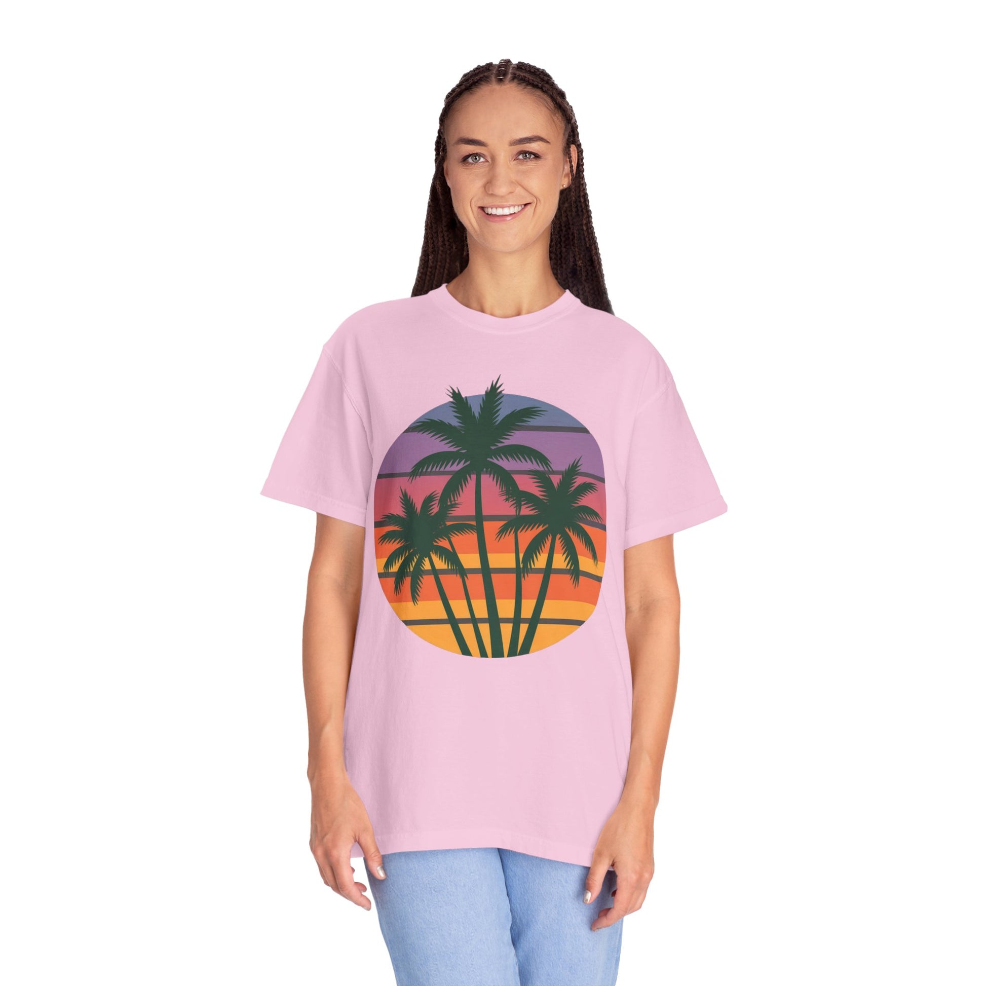 Palm Tree Sunset T-shirt showcasing a vibrant palm tree silhouette against a sunset sky, epitomizing a tropical vibe. Crafted from soft, durable garment-dyed fabric, perfect for casual outings and summer adventures.