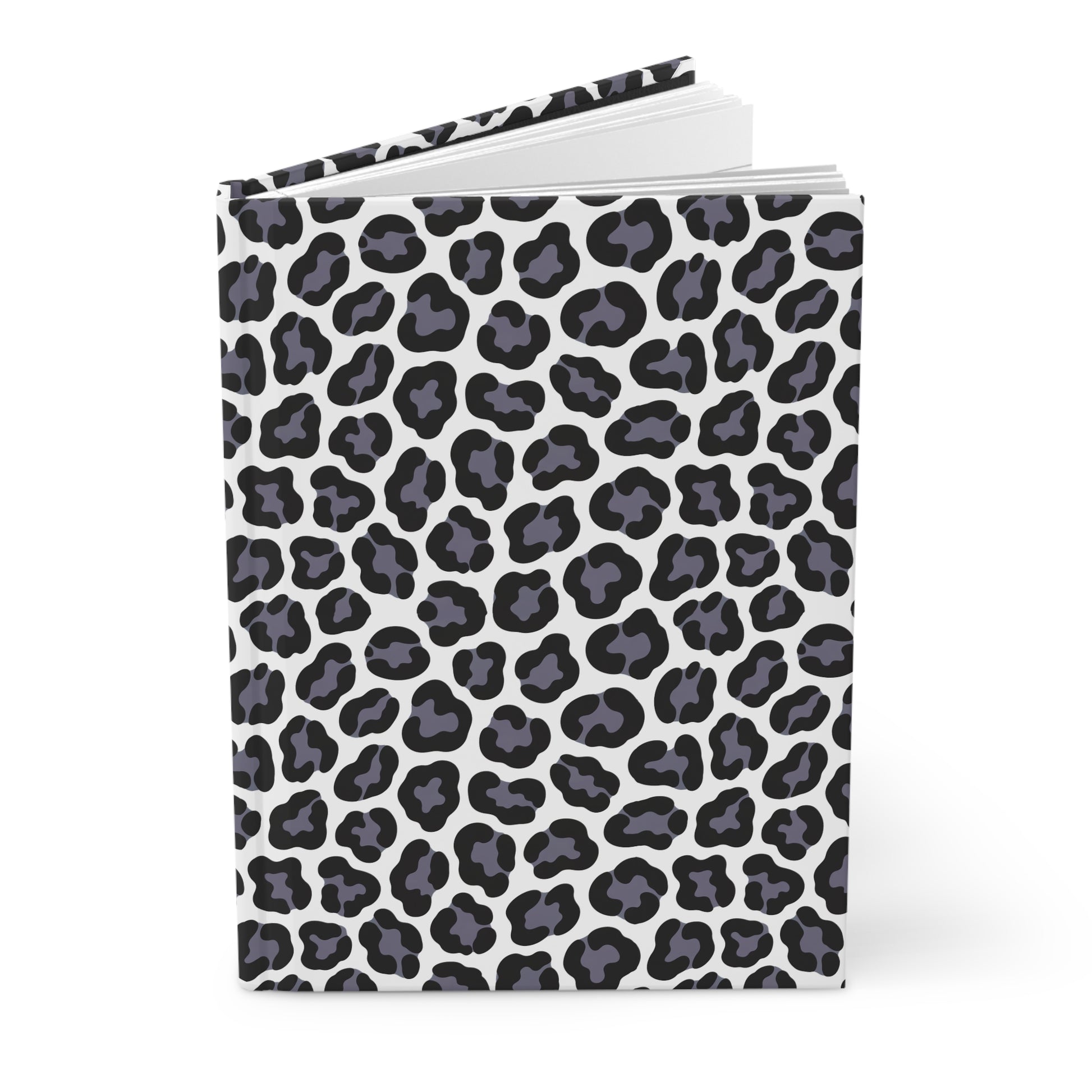 HARDCOVER JOURNAL, MATTE, RULED, 5X7, SEWN BIND, CLEAN-TEAR PAGES – LEOPARD: A stylish black-and-gray leopard spot cover on white, slightly open, revealing blank pages within.