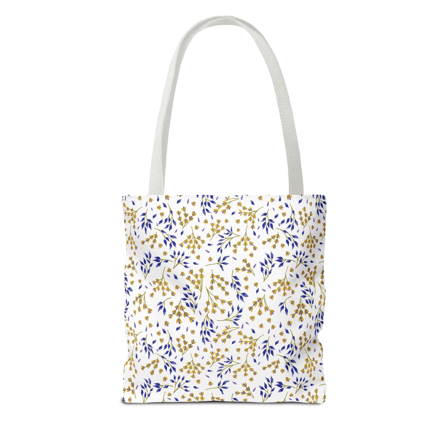 Wild Herb Garden Tote Bag features a white canvas body adorned with a golden-yellow and deep blue botanical sprigs pattern, offering a vibrant, durable option for summer outings or beach trips.