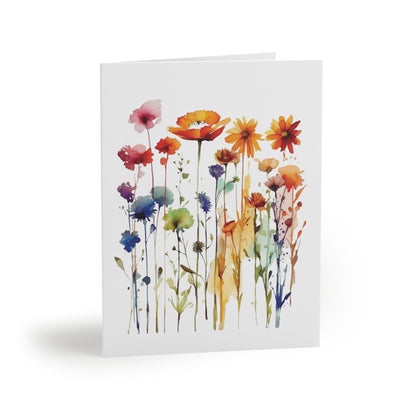 Wildflowers Greeting Cards — Pack of 8/16/24 features vibrant watercolor-style botanical illustrations of poppies and daisies, embodying FireBrook Designs' uplifting ethos. Perfect for personal messages, each card includes a matching envelope.
