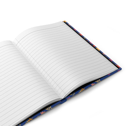 HARDCOVER JOURNAL, MATTE, RULED, 5X7, SEWN BIND, CLEAN-TEAR PAGES – FALL FOLIAGE design with open, lined pages and a glimpse of vibrant floral-patterned cover, ideal for joyful, stylish note-taking.