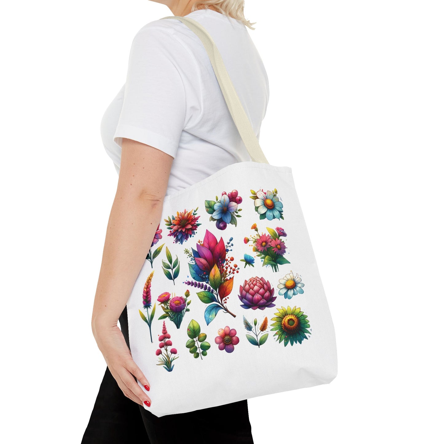 Floral Tote Bag: Woman holds a white tote featuring a colorful floral design, ideal for daily use with durable polyester and reinforced handles.