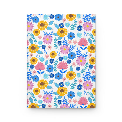 HARDCOVER JOURNAL, MATTE, RULED, 5X7, SEWN BIND, CLEAN-TEAR PAGES – CHEERFUL BLOOMS MIX features a vibrant floral pattern on a durable matte cover, embodying FireBrook Essentials' uplifting design ethos.