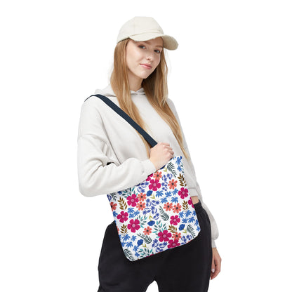 Floral Tote Bag with vibrant pink, orange, and blue flowers on a white backdrop. Features durable polyester, boxed corners, and dark straps. Ideal for joyful summer outings and everyday use.
